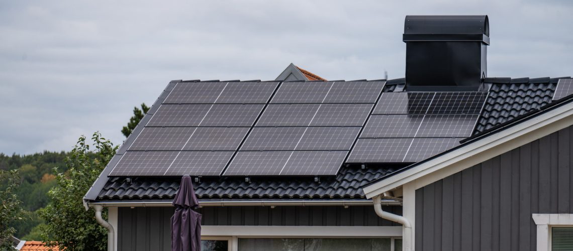 Mölndal, Sweden - september 10 2022: Solar cell panels installed on the roof of a house